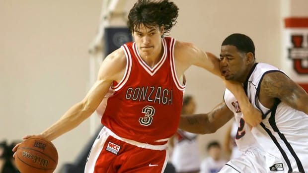 adam morrison red uniform